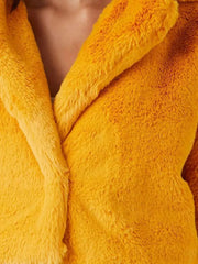 SelenaGomezMabelMoraOnlyMurdersInTheBuildingYellowFurJacket_2